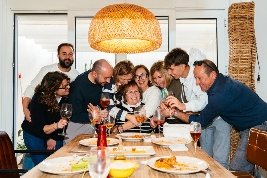 A family celebrating together around their mother