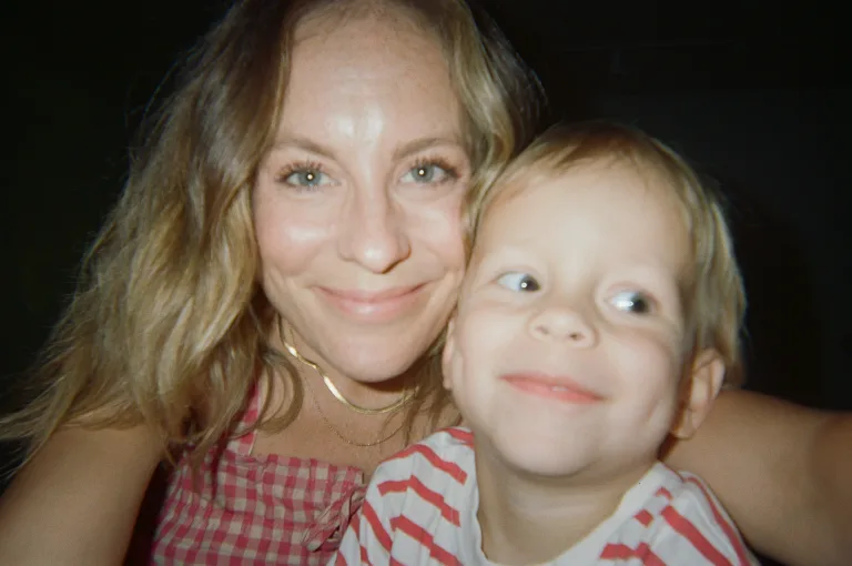 A mother and son taking a selfie