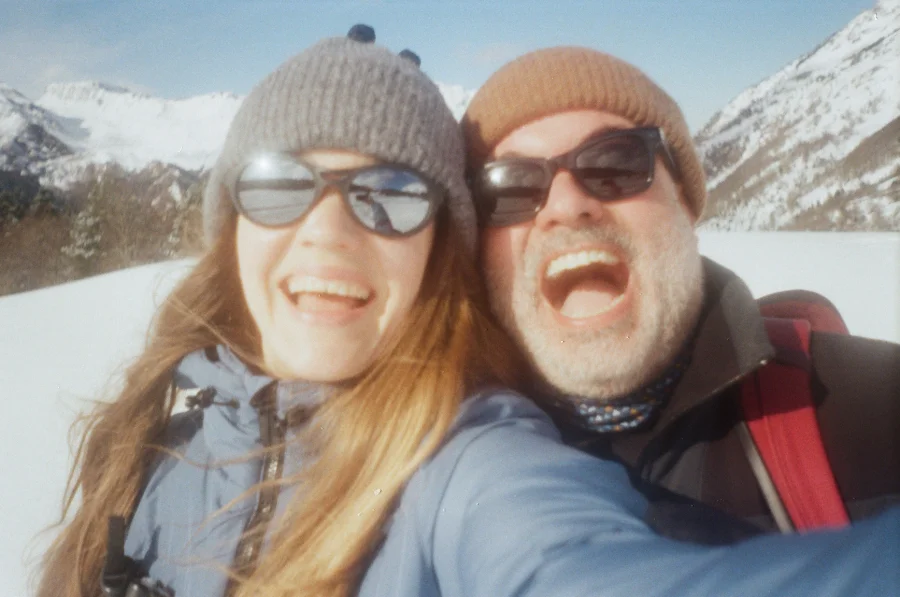 A couple taking a selfie on a ski trip